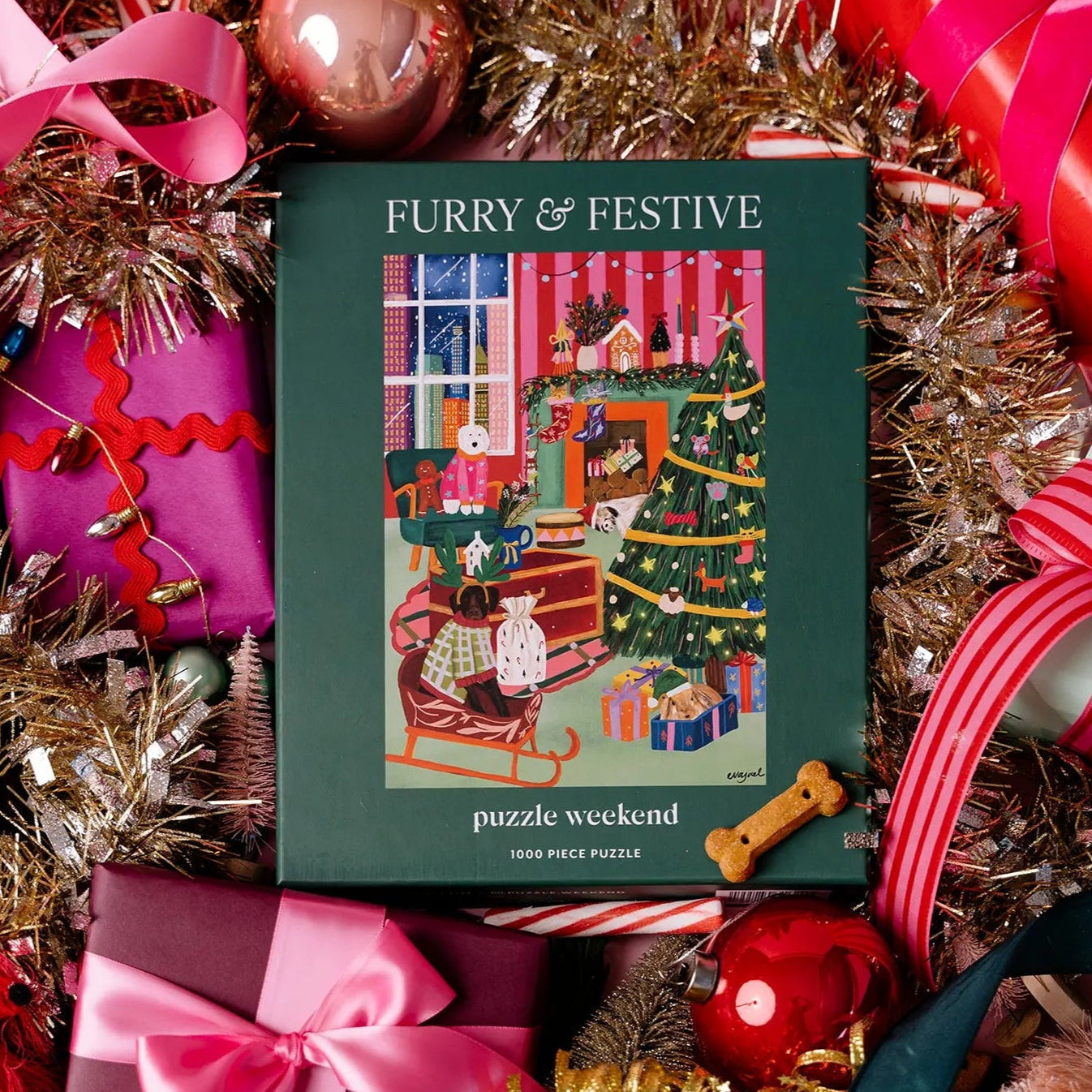 Furry & Festive puzzle packaging surrounded by Christmas decorations
