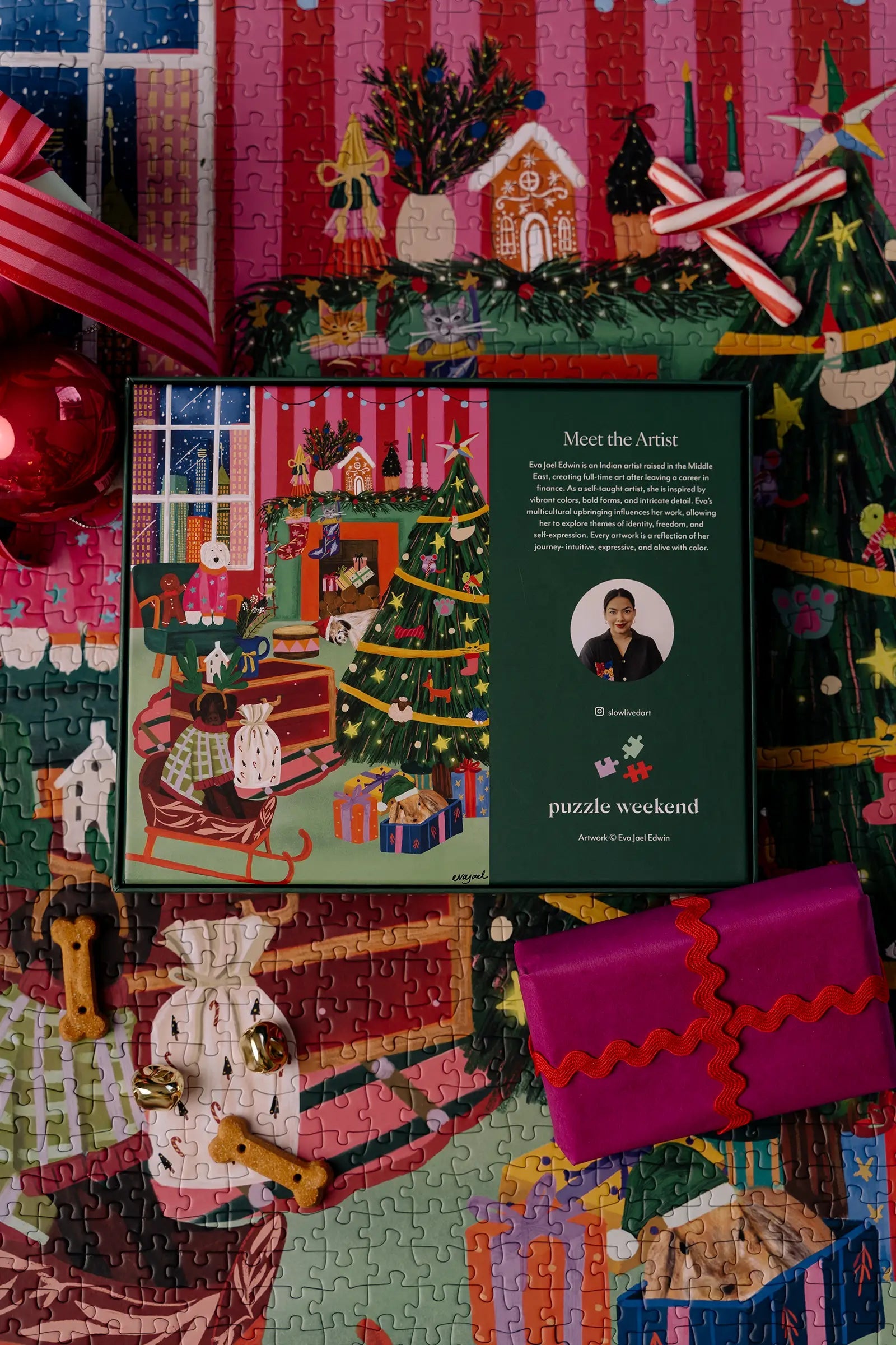 Jigsaw puzzle with Christmas-themed design, surrounded by decorative items.