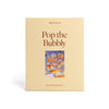 pop the bubbly 1000 piece jigsaw puzzle by piecework puzzles
