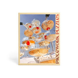 pop the bubbly 1000 piece jigsaw puzzle by piecework puzzles