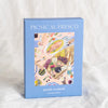 Puzzle box titled 'Picnic al Fresco' with a colorful illustration of a picnic scene on a white background.